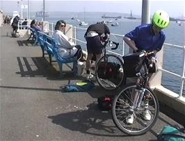 Putting the luggage back on the bikes at Falmouth Pier